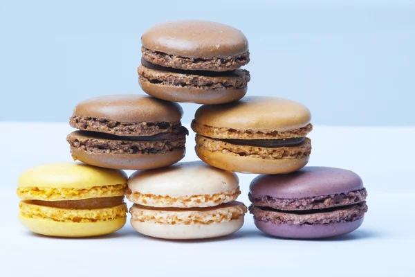 Lot of milticolored french macaroons, close-up Stock Photo