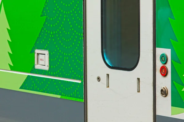Closeup of stationary train with closed cars doors — Stock Photo, Image