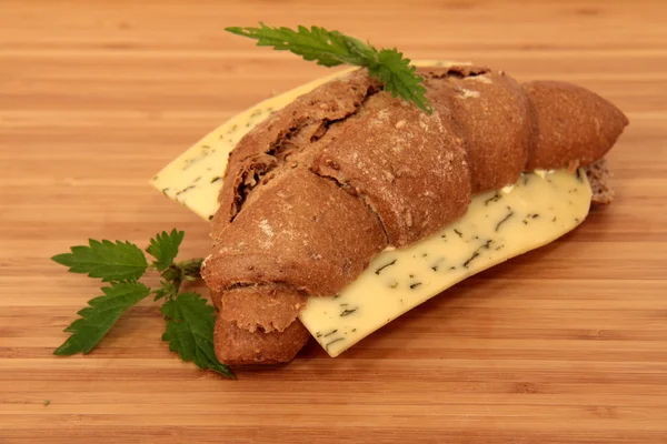 Bread roll with nettle cheese — Stock Photo, Image