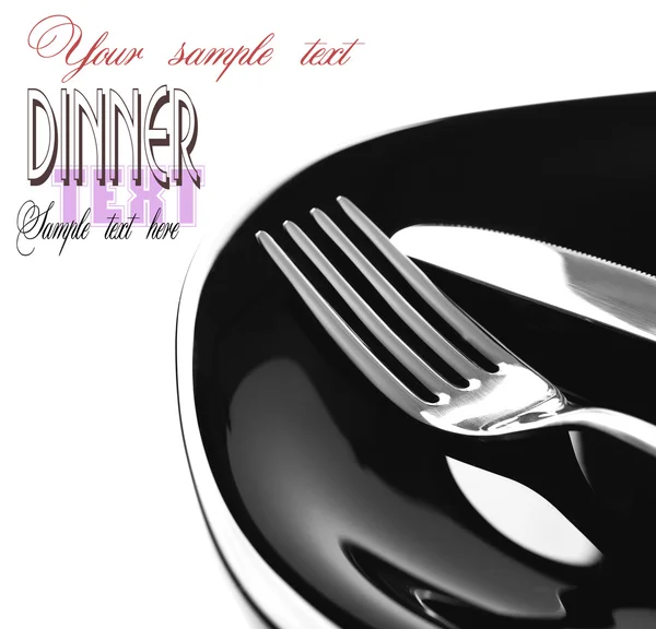 Fork and knife in elegant table setting Royalty Free Stock Photos