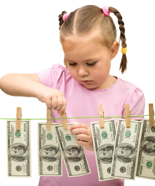 Χαριτωμένο κοριτσάκι με χαρτονόμισμα - δολάρια — Φωτογραφία Αρχείου