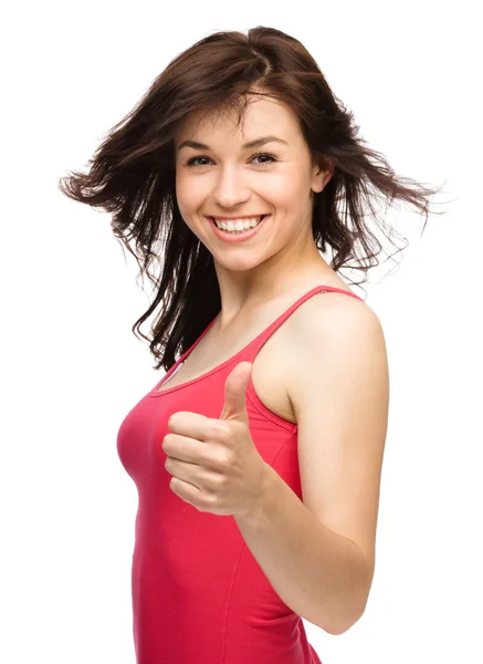 Frau zeigt Daumen-hoch-Geste — Stockfoto