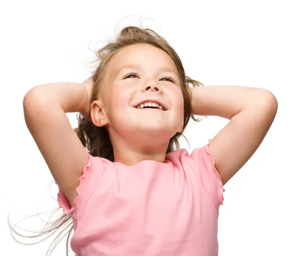 Little girl is stretching and rising hands up — Stock Photo, Image