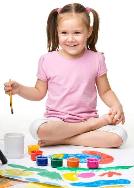 Cute cheerful child play with paints — Stock Photo, Image
