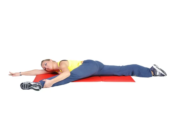 Přizpůsobit mladé ženské jóga instruktor zobrazení různých cvičení na bílém pozadí — Stock fotografie