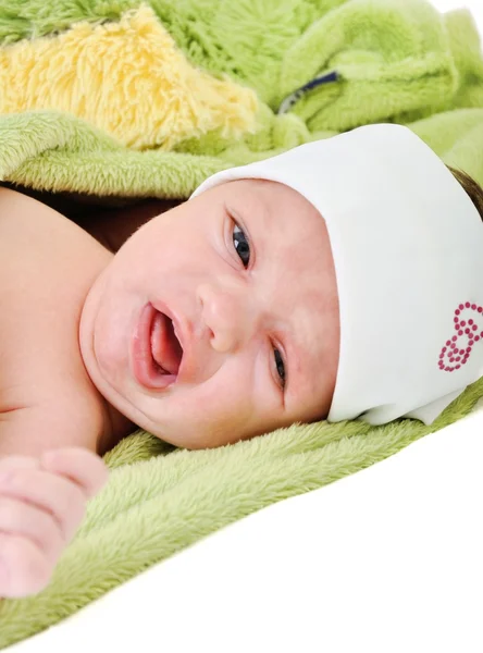 Portrait of cute newborn baby girl on a white background — Stock Photo, Image