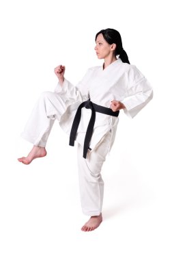 karate kadın beyaz bir arka plan üzerinde poz