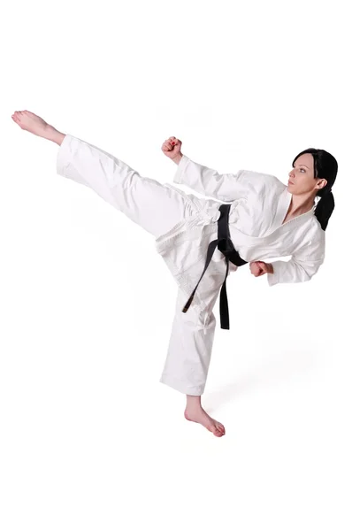 Karate vrouw die zich voordeed op een witte achtergrond — Stockfoto