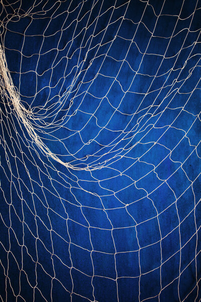 Net on blue wall