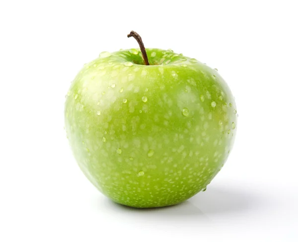Zelené jablko s kapkami Rosy — Stock fotografie