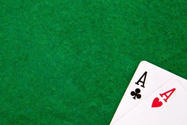 Texas holdem pocket aces on casino table with copy space — Stok fotoğraf