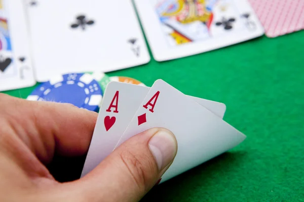 Pocket aces on a casino table — Stock Photo, Image