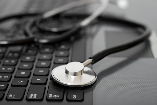 stock image Computer with stethoscope on it
