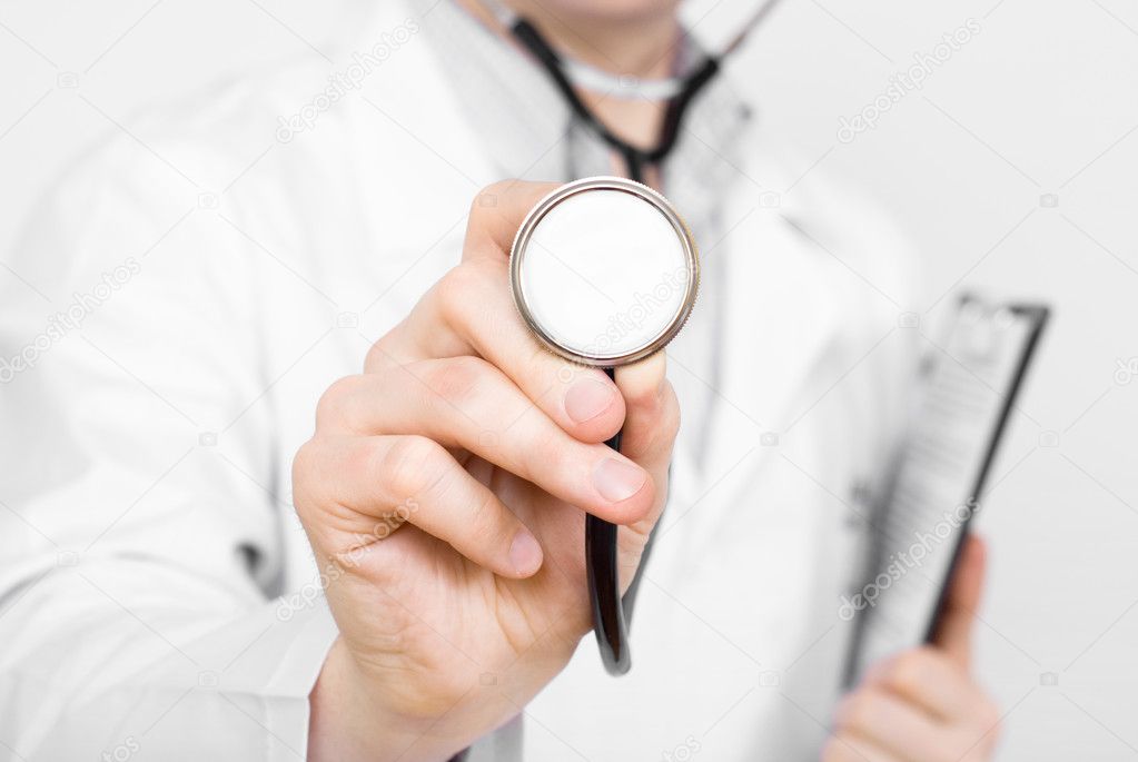 Doctor with stethoscope and clipboard
