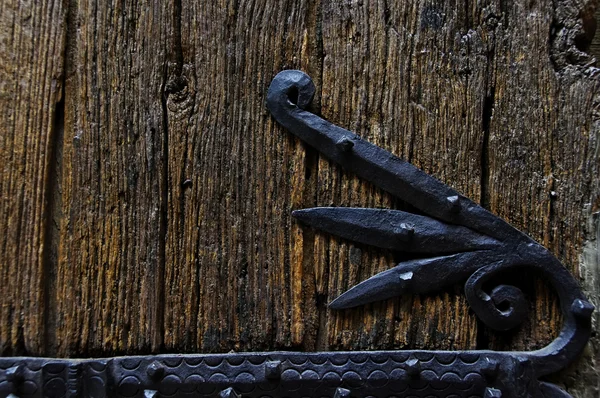 Legno e fondo in ferro battuto — Foto Stock