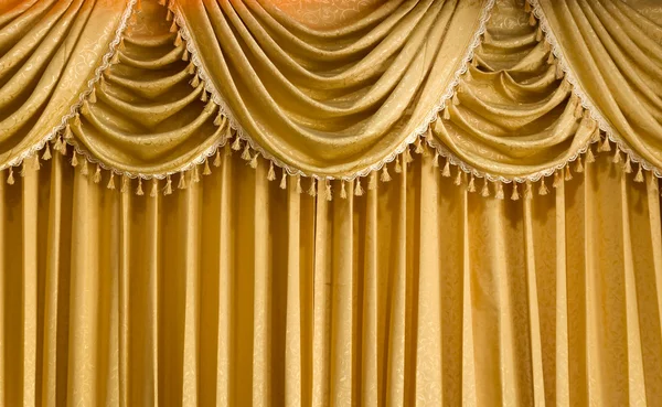 Luz cortina de tecido de ouro — Fotografia de Stock