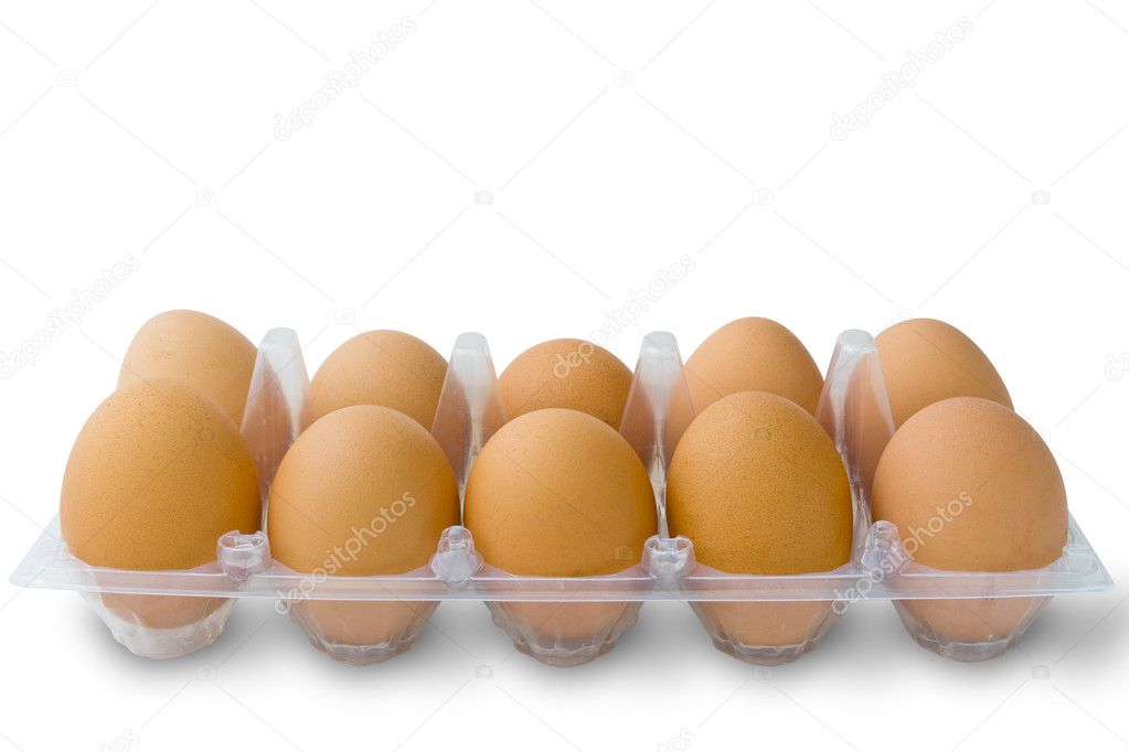 Tien ei in schone plastic pack op witte tafel.