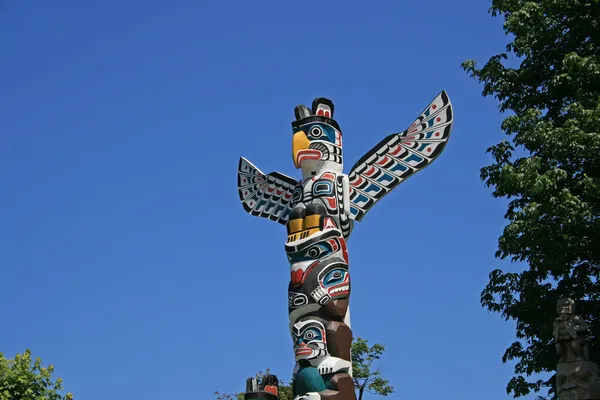 Totem Poles i Stanley Park, Vancouver Canada Royaltyfrie stock-billeder