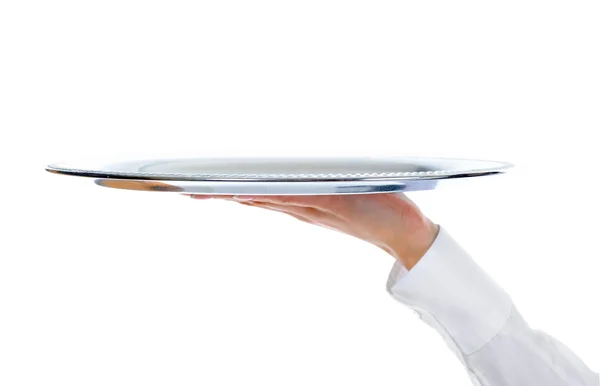 Garson holding boş gümüş tepsi — Stok fotoğraf