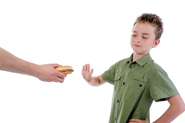 Μικρό αγόρι που τρώει ένα χάμπουργκερ — Φωτογραφία Αρχείου