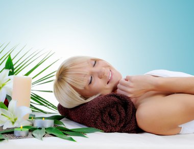 Young woman at spa procedure clipart
