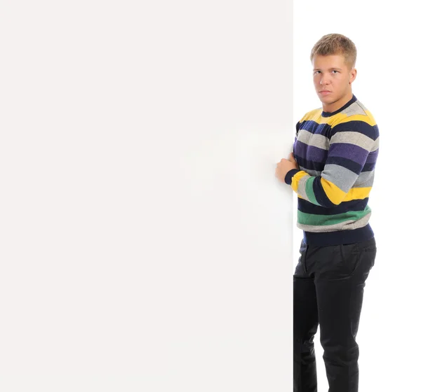 Jonge man met een lege witte kaart — Stockfoto