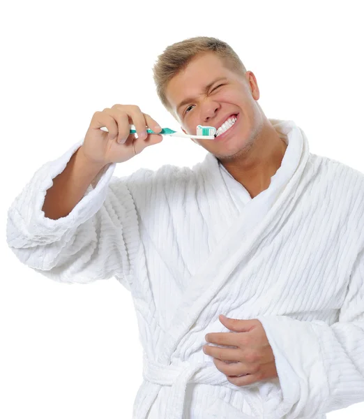 Mann putzt sich die Zähne — Stockfoto