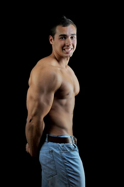 Bodybuilder showing his muscles — Stock Photo, Image