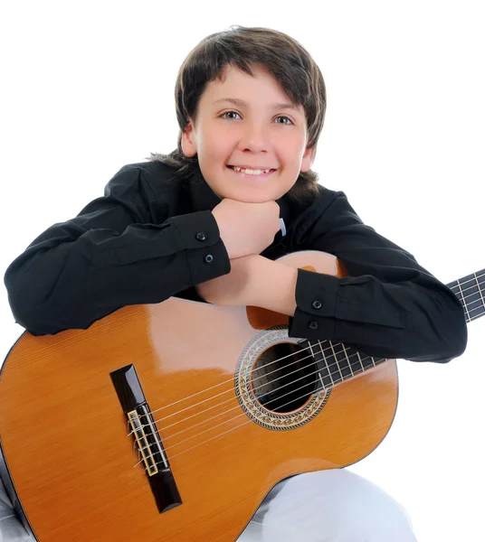 Kis fiú zenész gitározni — Stock Fotó