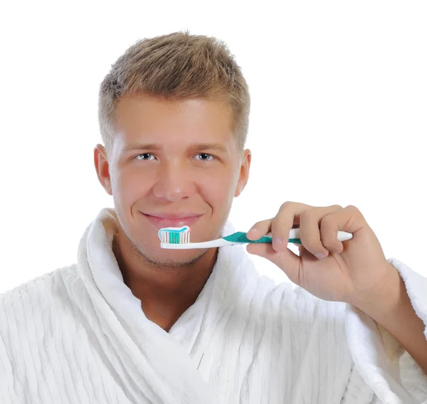 Hombre cepillándose los dientes —  Fotos de Stock