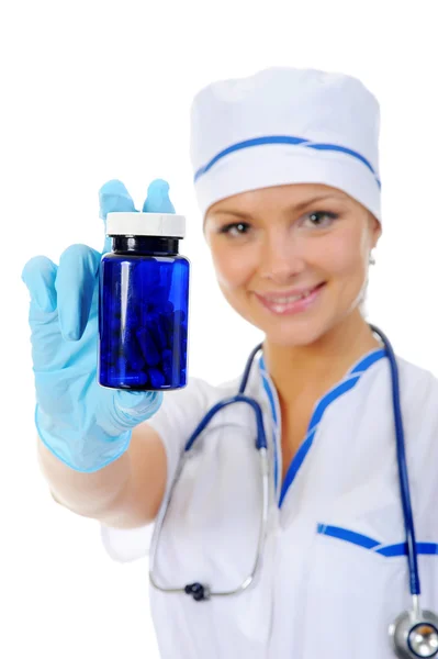 Doutor segurando uma pílula . Fotos De Bancos De Imagens