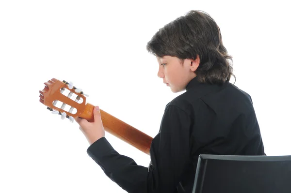 Trochę chłopiec muzyk grający na gitarze — Zdjęcie stockowe