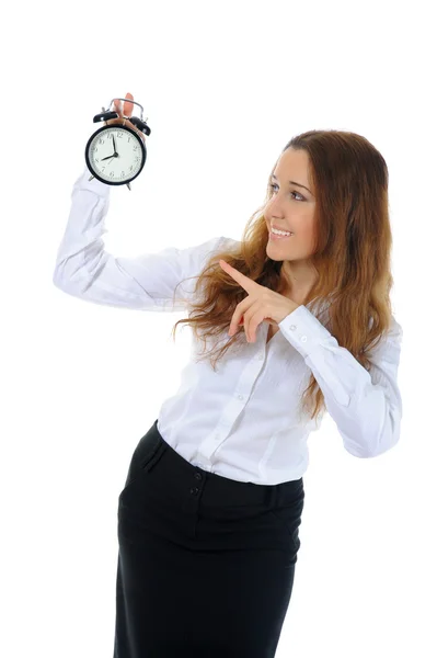 Businesswoman with an alarm clock — Stock Photo, Image