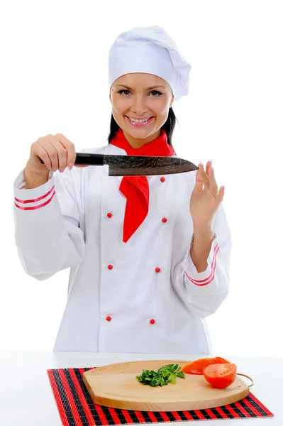 Chef corta o tomate Imagem De Stock