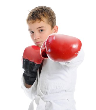 Young boy training karate. clipart