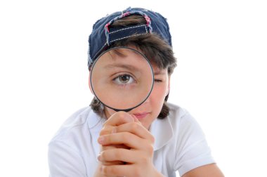 Boy looking through a magnifying glass clipart