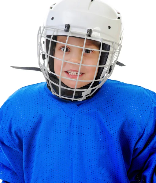 Liten pojke ishockeyspelare. — Stockfoto