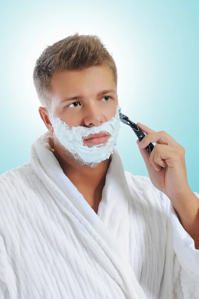 Ung mann barberer seg – stockfoto