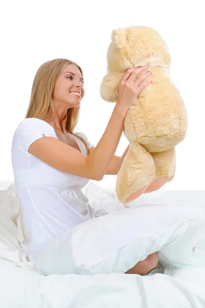 Jeune femme avec ours en peluche — Photo