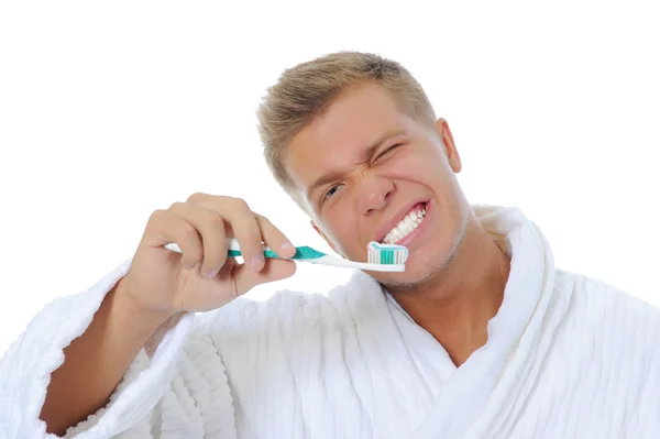 Ο άνθρωπος βουρτσίζει τα δόντια του — Φωτογραφία Αρχείου