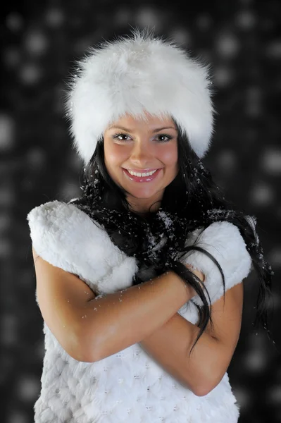 Όμορφη γυναίκα σε ένα καπέλο του χειμώνα Royalty Free Εικόνες Αρχείου