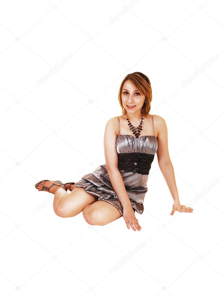 Girl sitting on floor..