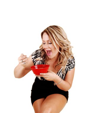 Woman eating. clipart