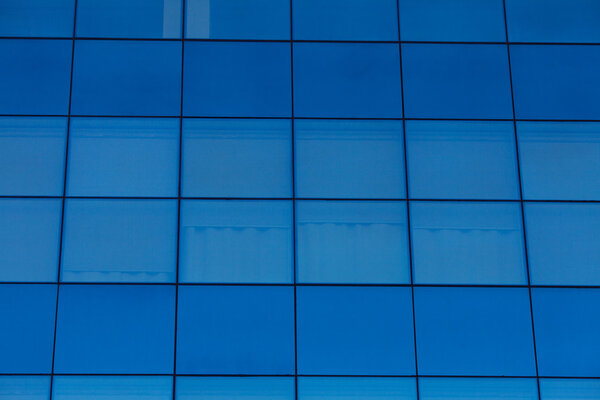 Background of the glass modern office building