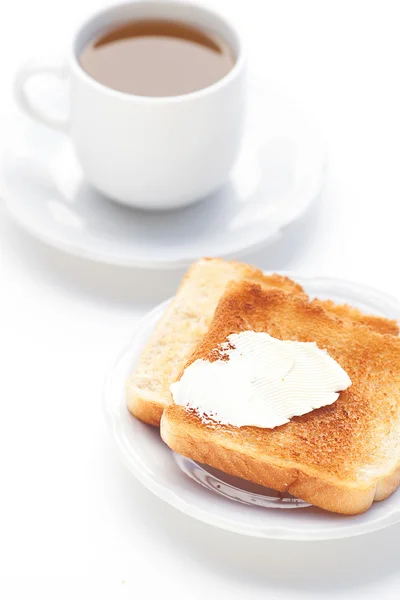 Herbaty i tostów z masłem na białym tle — Zdjęcie stockowe
