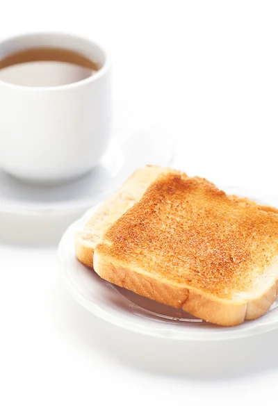 Tea and toast isolated on white — Stock Photo, Image