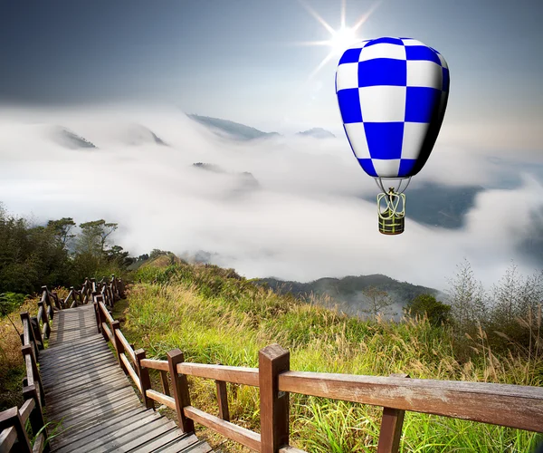 stock image Greece style building with colorful hot air balloons