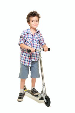 Naughty hairy little boy in shorts and shirt with scooter clipart