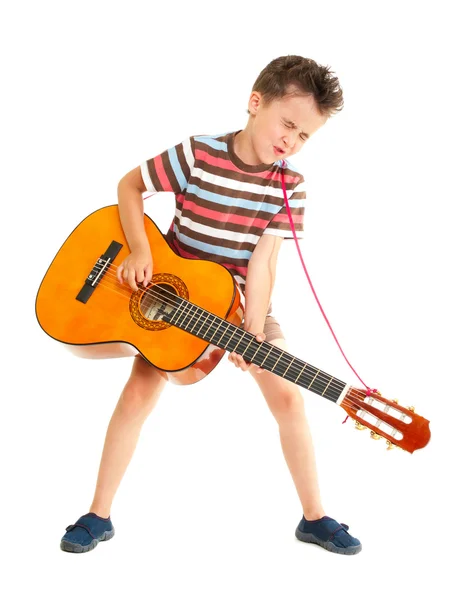 Little boy plays guitar country style — Stok fotoğraf