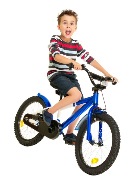 Upphetsad liten pojke på cykel — Stockfoto